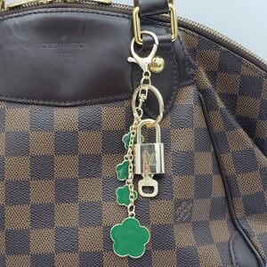 Authentic Louis Vuitton Gold Padlock with Unbranded Green Flower Keychain 012826